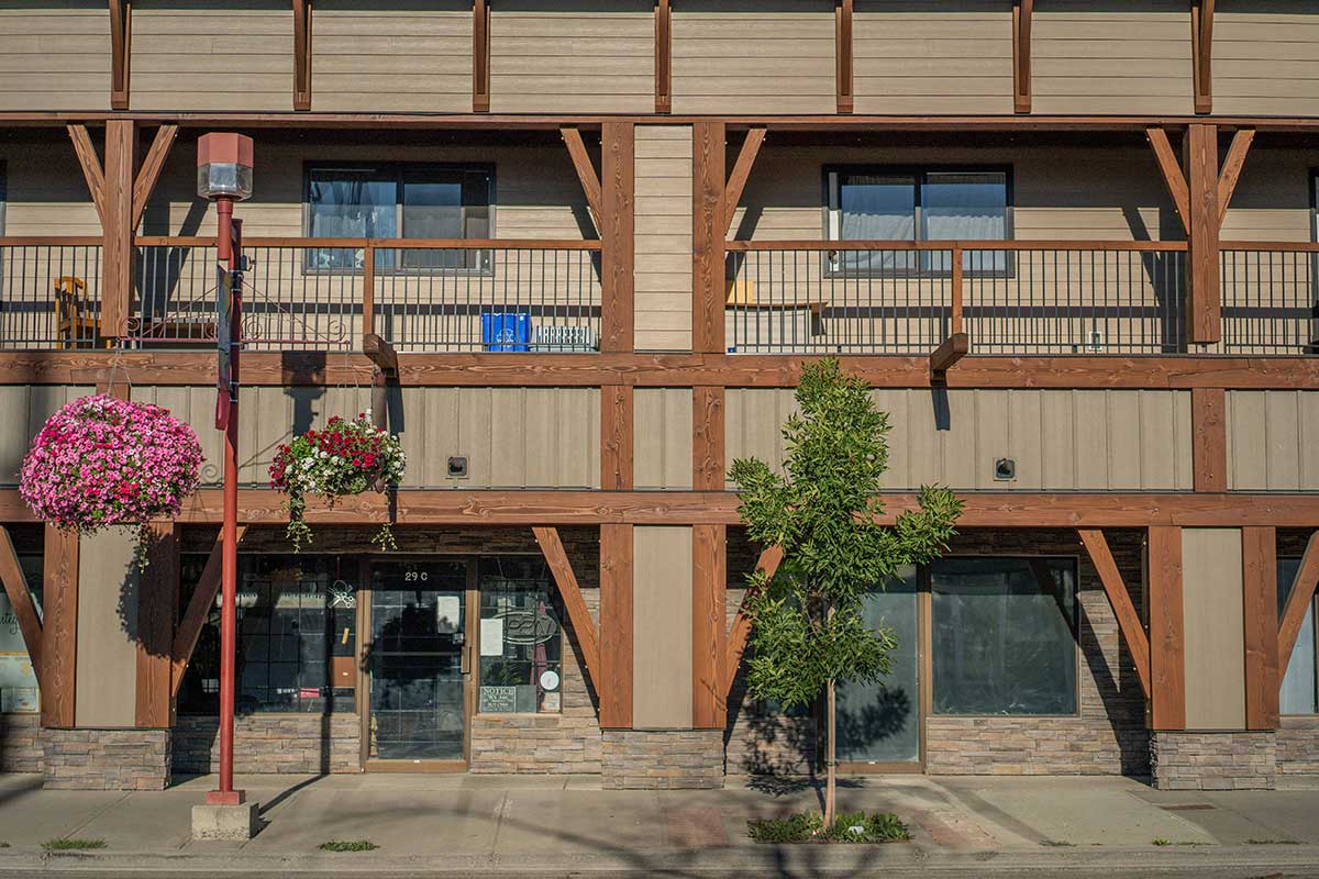 Front view of a commercial building featuring exposed timber frame elements, built by Smith Timber Works.