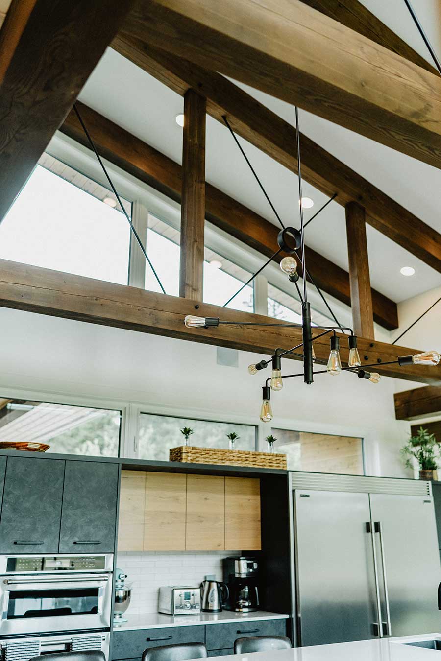 Architectural timber truss system by Smith Timber Works, enhancing a modern kitchen design