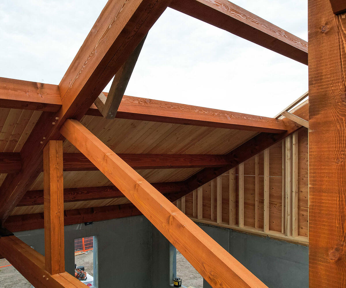 Robust timber framing and roof structure by Smith Timber Works, showcasing Canadian craftsmanship in British Columbia.