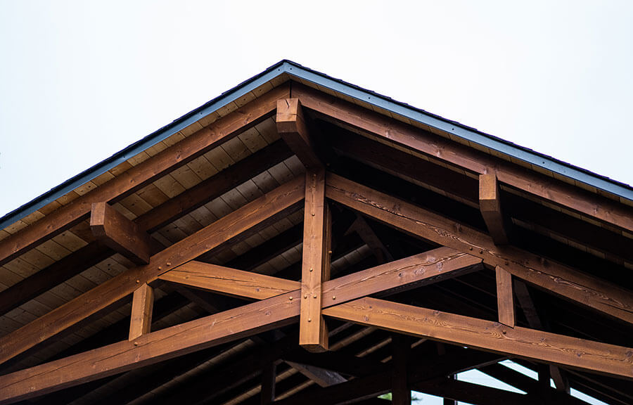 Custom timber roof trusses and joinery by Smith Timber Works, British Columbia.
