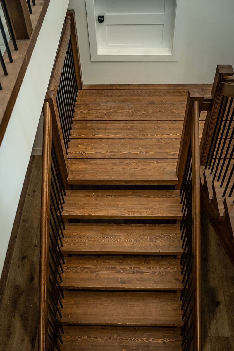 Elegant timber stairs with custom railings by Smith Timber Works, Vancouver.