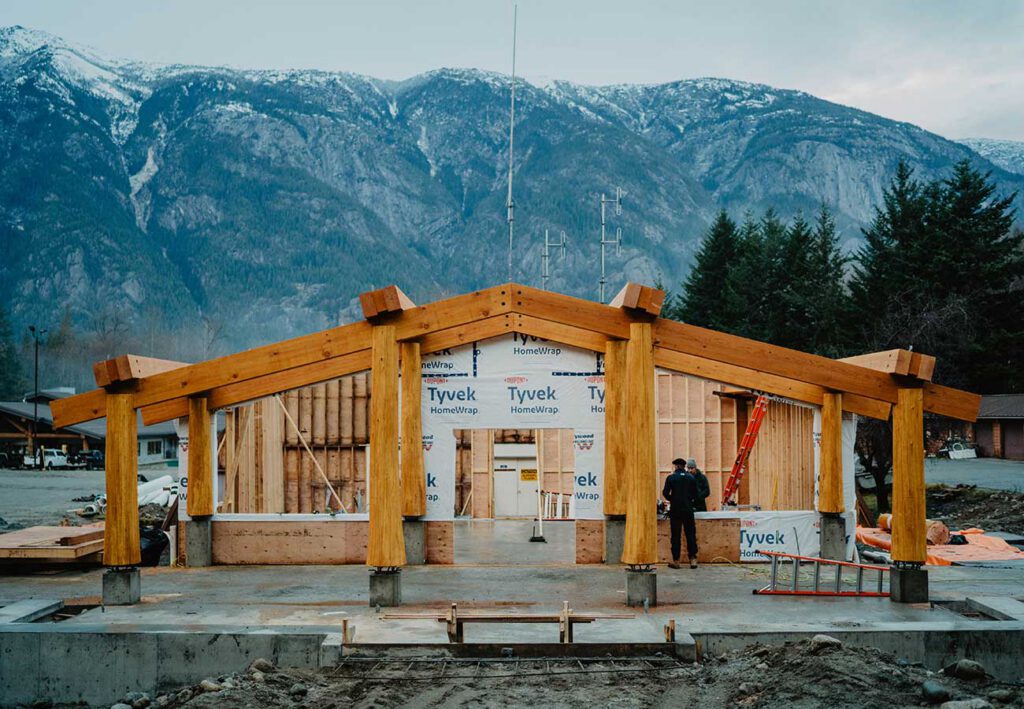 Timber frame entry structure by Smith Timber Works, showcasing Canadian craftsmanship and design.